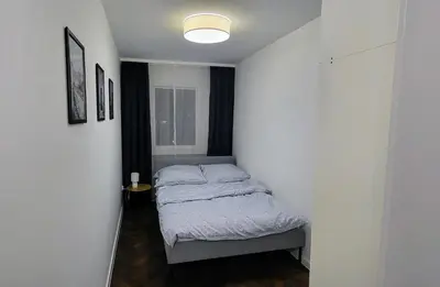 Łóżko lub łóżka w pokoju w obiekcie Siódme Niebo