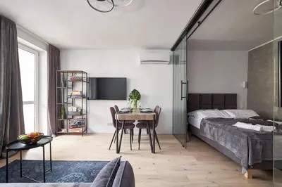 Łóżko lub łóżka w pokoju w obiekcie Platinum Apartment - Parking - Klimatyzacja - Winda - Self check in
