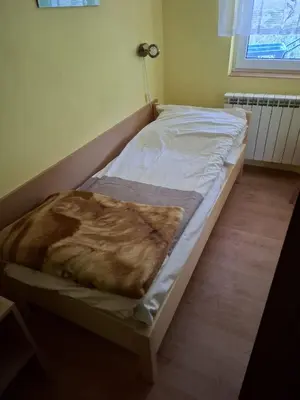 Łóżko lub łóżka w pokoju w obiekcie Roman Tarnawa 