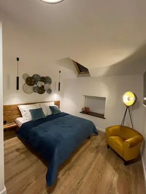 Łóżko lub łóżka w pokoju w obiekcie Green Apart