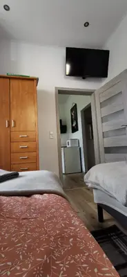 Łóżko lub łóżka w pokoju w obiekcie Apartament Pod Bukiem