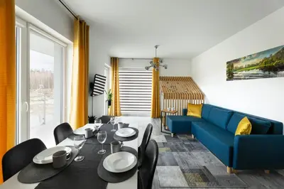 Część wypoczynkowa w obiekcie Apartament Rodzinny - Lamelowy Domek