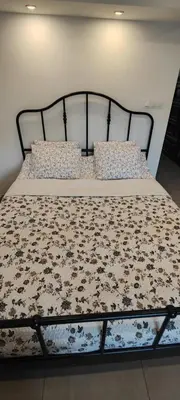 Łóżko lub łóżka w pokoju w obiekcie Apartament Kopernik