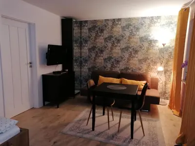 Telewizja i/lub zestaw kina domowego w obiekcie Apartament u Przewodnika Sudeckiego