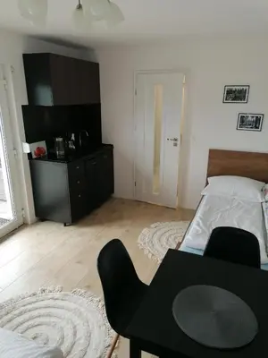 Łóżko lub łóżka w pokoju w obiekcie Apartament u Przewodnika Sudeckiego