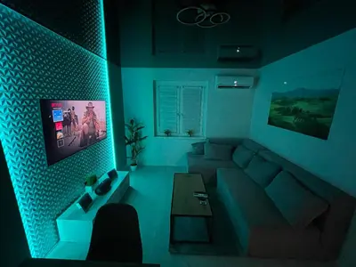 Telewizja i/lub zestaw kina domowego w obiekcie Apartament Nadbrzezna