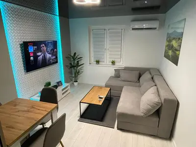 Telewizja i/lub zestaw kina domowego w obiekcie Apartament Nadbrzezna