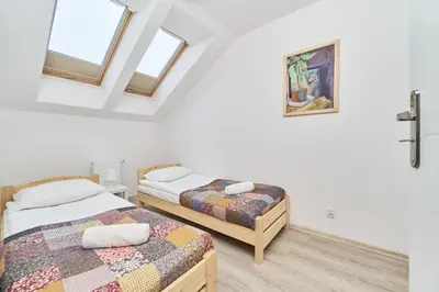 Łóżko lub łóżka w pokoju w obiekcie Drabika Apartment Balcony & Private Parking Wrocław by Noclegi Renters