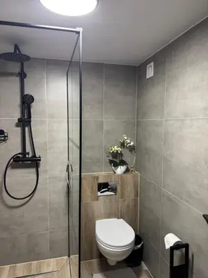 Łazienka w obiekcie Dawna Mleczarnia Apartamenty LOFT