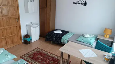 Łóżko lub łóżka w pokoju w obiekcie Agroturystyka STANICA