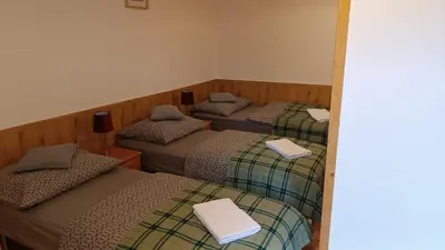 Łóżko lub łóżka w pokoju w obiekcie Agroturystyka STANICA
