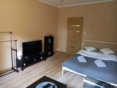 Łóżko lub łóżka w pokoju w obiekcie Apartament Górski