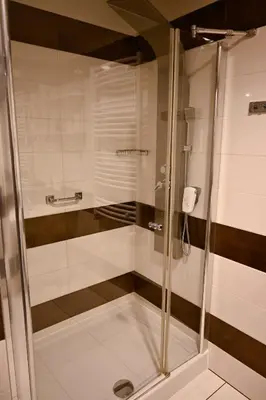 Łazienka w obiekcie Zielone Apartamenty z aneksem kuchennym