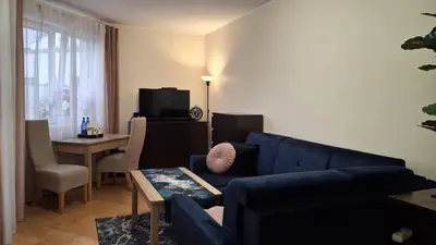 Telewizja i/lub zestaw kina domowego w obiekcie Mieszkanie blisko centrum Kalisza z garażem