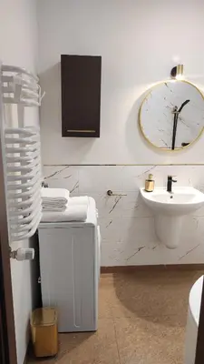 Łazienka w obiekcie Mieszkanie blisko centrum Kalisza z garażem