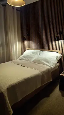 Łóżko lub łóżka w pokoju w obiekcie Mieszkanie blisko centrum Kalisza z garażem