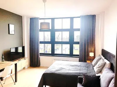 Telewizja i/lub zestaw kina domowego w obiekcie Apartimento Hydral Viene