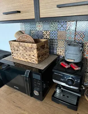 Kuchnia lub aneks kuchenny w obiekcie Dawna Mleczarnia Apartamenty MIODOWY