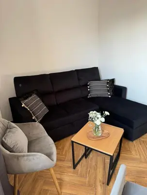 Część wypoczynkowa w obiekcie Dawna Mleczarnia Apartamenty SŁONECZNY