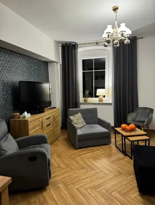 Część wypoczynkowa w obiekcie Dawna Mleczarnia Apartamenty SŁONECZNY