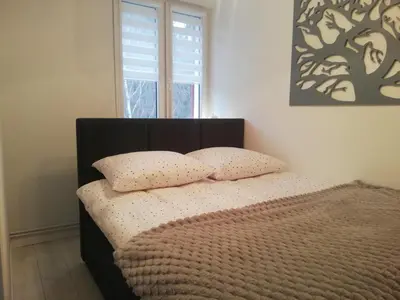 Łóżko lub łóżka w pokoju w obiekcie Apartament Stella