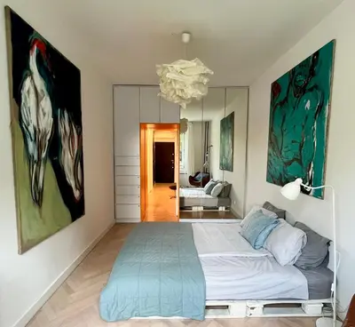 Łóżko lub łóżka w pokoju w obiekcie Art & Design 3 rooms apartment in city center