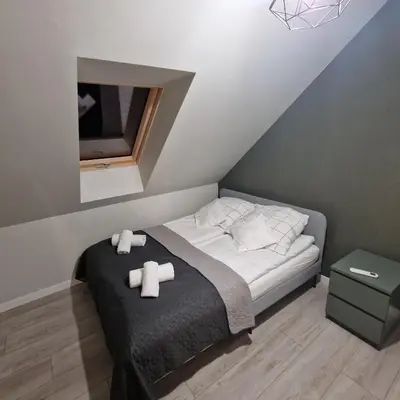 Łóżko lub łóżka w pokoju w obiekcie All Season Sauna&Jacuzzi - Klimat - Willa z widokiem na góry Kotlina Kłodzka 4km do Zieleniec SKI Arena