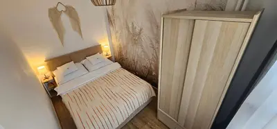 Łóżko lub łóżka w pokoju w obiekcie Apartament Boho