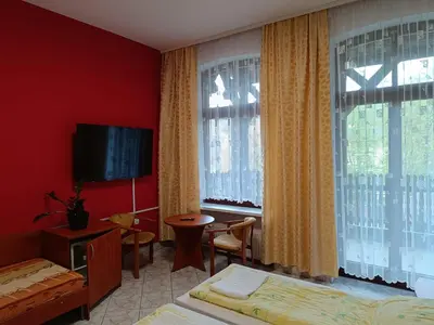 Telewizja i/lub zestaw kina domowego w obiekcie Dom Wczasowy Magnolia