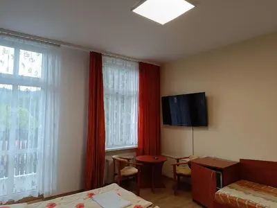 Telewizja i/lub zestaw kina domowego w obiekcie Dom Wczasowy Magnolia