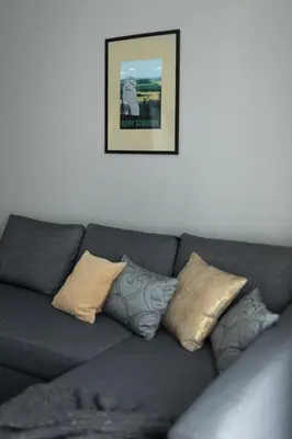 Część wypoczynkowa w obiekcie Apartament z kominkiem