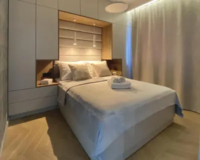 Łóżko lub łóżka w pokoju w obiekcie GREY House + free parking
