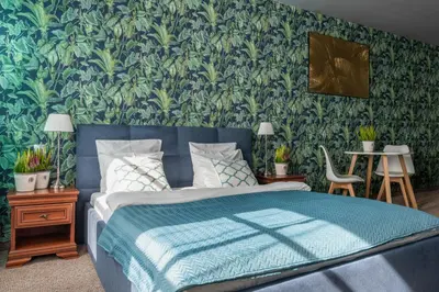 Łóżko lub łóżka w pokoju w obiekcie Staycity Apartments Sukiennice 6