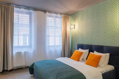 Łóżko lub łóżka w pokoju w obiekcie Staycity Apartments Sukiennice 6