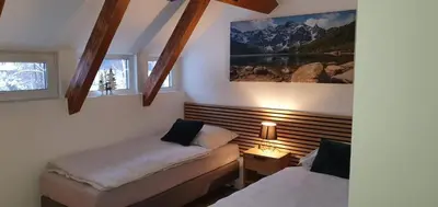 Łóżko lub łóżka w pokoju w obiekcie Pokoj 3 osobowy u Makosi