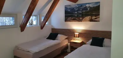 Łóżko lub łóżka w pokoju w obiekcie Pokoj 3 osobowy u Makosi