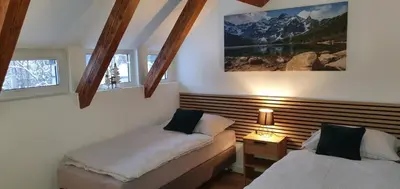 Łóżko lub łóżka w pokoju w obiekcie Pokoj 3 osobowy u Makosi