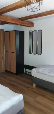 Łóżko lub łóżka w pokoju w obiekcie Pokoj 3 osobowy u Makosi