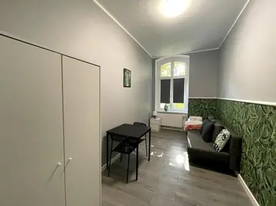 Część wypoczynkowa w obiekcie Big Apart next to Galeria Dominikańska - 4 Rooms