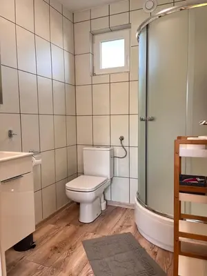 Łazienka w obiekcie Domki całoroczne U Iwony#sauna#balia