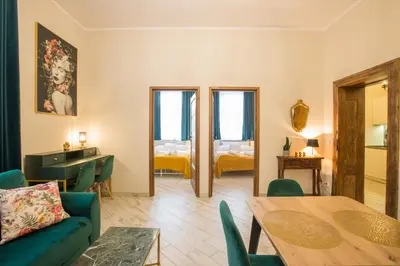 Łóżko lub łóżka w pokoju w obiekcie Apartament Piastowski