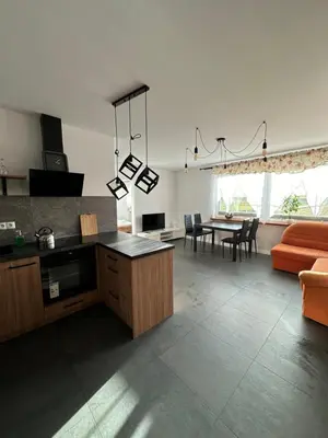 Kuchnia lub aneks kuchenny w obiekcie Apartamenty Czerwona Stodoła