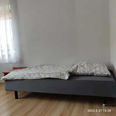 Łóżko lub łóżka w pokoju w obiekcie Apartament Pod Lipą
