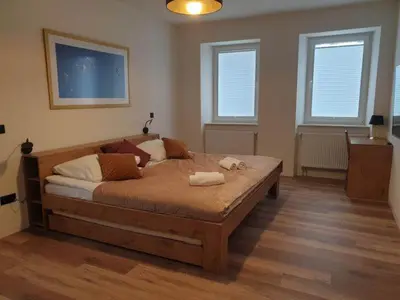 Łóżko lub łóżka w pokoju w obiekcie Apartament Zimowiec