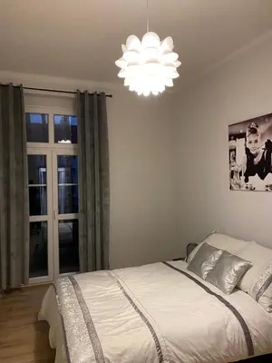 Łóżko lub łóżka w pokoju w obiekcie Apartament Second Home