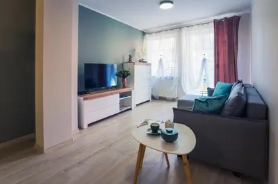 Telewizja i/lub zestaw kina domowego w obiekcie Apartament w Kamienicy na Kłodzkiej