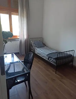 Łóżko lub łóżka w pokoju w obiekcie Apartament Stara Tkalnia