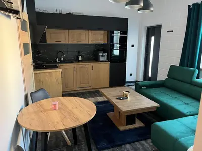Kuchnia lub aneks kuchenny w obiekcie Apartamenty Słowianka-BUTELKOWY