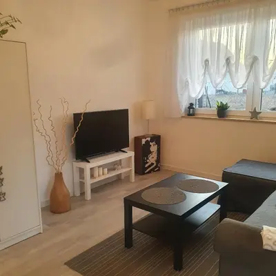 Telewizja i/lub zestaw kina domowego w obiekcie Apartament LEXY