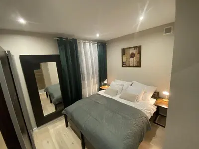 Łóżko lub łóżka w pokoju w obiekcie Apartament Błogi Sen III - komfortowy nocleg w spokojnej lokalizacji